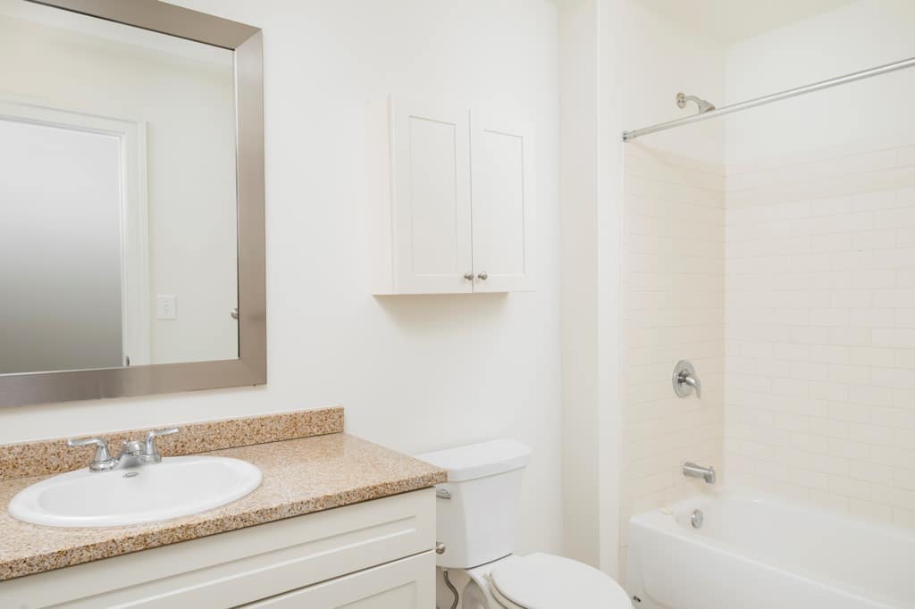 2040 Market Street Apartments Bathroom Mirror Sink Toilet Bathtub Cabinets
