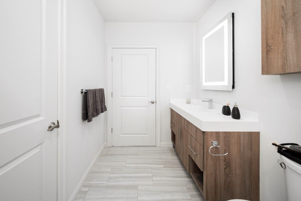 218 Arch Street Apartments Bathroom Sink Counter Mirror